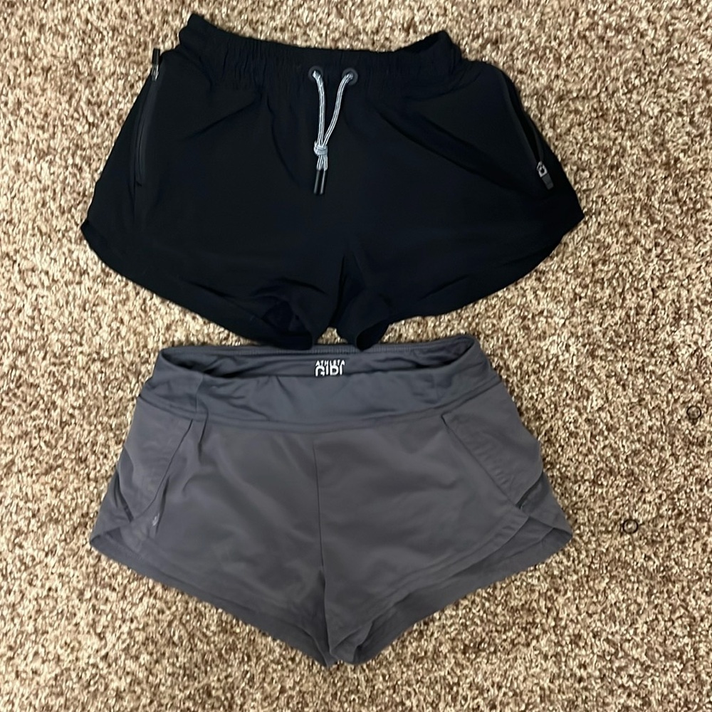 2 pairs (grey and black) size medium (8-10) athleta girl shorts.